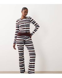 The Frolic - Exclusive Ribbed Fold Over Flare Pants - Lyst