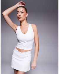 4505 - Canotta Bianca Con Reggiseno Interno, Scollo A V E Dorso A Vogatore - Lyst