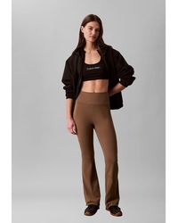 Calvin Klein - Quick-Dry High-Rise Flared Gym Leggings - Lyst