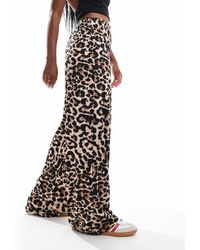 Vila - – schlupfhose mit leopardenmuster und weitem bein - Lyst