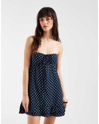 Hollister - Bandeau Tie Up Ruffle Babydoll Mini Dress - Lyst