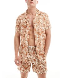 Chelsea Peers - – strandhemd aus viskose mit tropischem kachelprint, kombiteil - Lyst