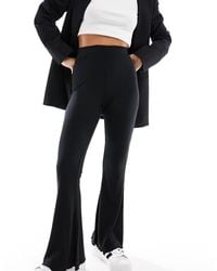 ASOS - Asos Design Petite Rib Flare Trouser With Lettuce Hem - Lyst