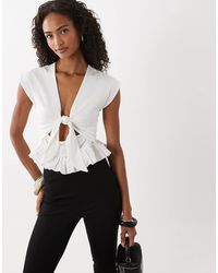 ASOS - Tie Front Cutout Top With Peplum Hem - Lyst