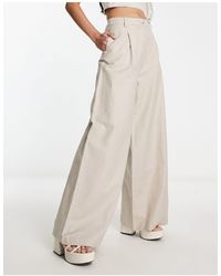 ASOS - Pantaloni con fondo ampio a vita alta color pietra - Lyst
