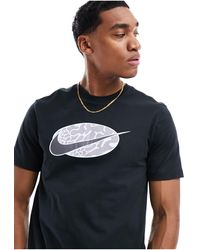 Nike - Camiseta negra y gris con logo - Lyst