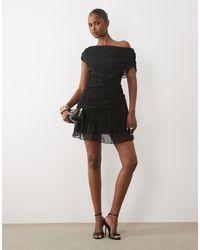 Fashionkilla - Exclusive Chiffon Off Shoulder Asymmetric Hem Mini Dress - Lyst