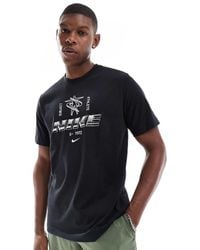 Nike - Camiseta Negra Con Estampado Gráfico Metalizado Del Logo Dri-Fit De - Lyst
