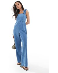 ASOS - Soft Denim Jumpsuit With Frill Strap - Lyst