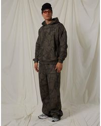 Good For Nothing - Oversized Cotton Fleece Camo Joggers - Lyst