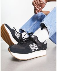 New Balance - 574+ - sneakers nere con stampa animalier - Lyst