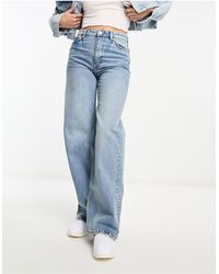 Monki - Yoko - jeans medio con fondo ampio - Lyst