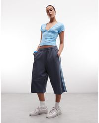 Collusion - Short baggy long en jersey à rayures style sport - Lyst