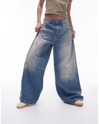 TOPSHOP - Jeans cargo medio a fondo ampio invecchiati - Lyst