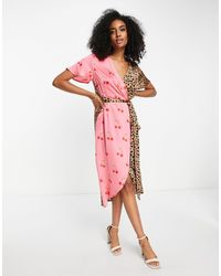 Never Fully Dressed - Robe portefeuille mi-longue contrastante avec imprimés léopard et cerises - Lyst