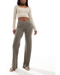 Monki - Pantalon ample en jersey ultra doux avec taille basse - kaki - Lyst