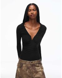 Bershka - V-neck Long Sleeve Bodysuit - Lyst