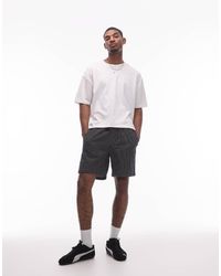 TOPMAN - Pantalones Cortos Negros A Rayas Holgados De Tejido Texturizado De - Lyst