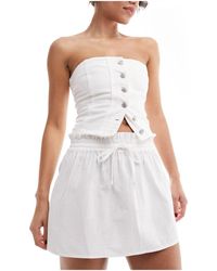 ASOS - Minifalda blanca con lazada en la cintura - Lyst