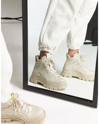 buffalo vegan aspha flat ankle boots in white