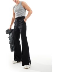 ASOS - Pantaloni eleganti vintage a zampa neri con spacco laterale - Lyst