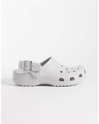 Crocs™ - Classic clogs mit metallic-schnalle - Lyst