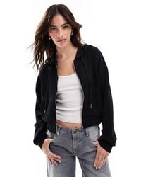 Stradivarius - Felpa Con Cappuccio Nera Morbida Al Tatto Con Zip - Lyst