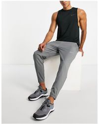 nike running uv challenger dri fit hybrid joggers in black
