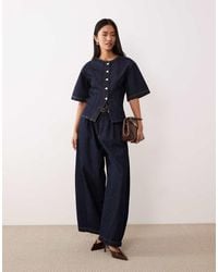 ASOS - Getailleerde Denim Top Met Korte Mouwen Zonder Kraagje - Lyst