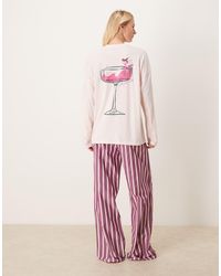 ASOS - Asos design tall - pyjama avec t-shirt manches longues oversize à imprimé cocktail et pantalon tissé ample à rayures - Lyst