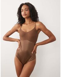 Spanx - Shape Invisible Shaping Cami Lingerie Thong Bodysuit - Lyst