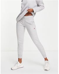 NB Classic Core Fleece Pant di New Balance in Nero abbigliamento da palestra e sportivo da Activewear Donna Activewear abbigliamento da palestra e sportivo New Balance 