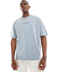 ASOS - Camiseta gris lavado extragrande con estampado del logo en el pecho - Lyst