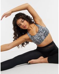 Onzie Mudra - reggiseno sportivo da yoga con supporto medio e stampa pitonata - Multicolore