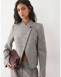 Mango - Celia blazer-kombiteil mit hohem kragen und knopfdetail im grauen karomuster - Lyst