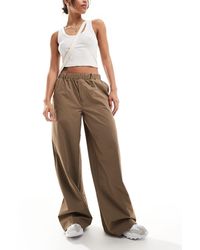 Noisy May - Pantaloni a vita alta con fondo ampio color cuoio - Lyst