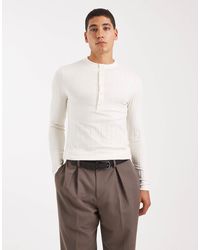 ASOS - T-shirt moulant à larges côtes, manches longues et col boutonné - crème - Lyst