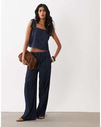 Mango - Calonge Tie Waist Pleated Front Wide Leg Denim Pants - Lyst