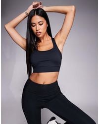 4505 - High Support Sports Bra With Adjustable Straps And Removeable Padding - Lyst