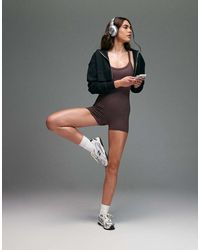 4505 - Seamless Baby Rib Racer Back Romper With Adjustable Straps And Inner Bra - Lyst