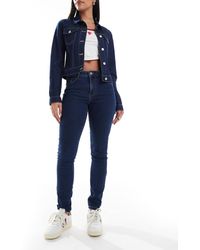Vero Moda - Vaqueros De Corte Pitillo Y Talle Medio Con Lavado Medio Elly De -Azul - Lyst