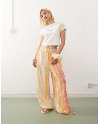 Reclaimed (vintage) - Pantalon à enfiler à rayures - rose et jaune - Lyst