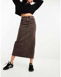 Stradivarius - – elastischer midi-jeansrock - Lyst