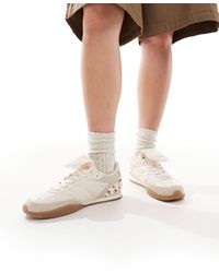 Stradivarius - – sneaker aus leder mit kuhfellmuster - Lyst