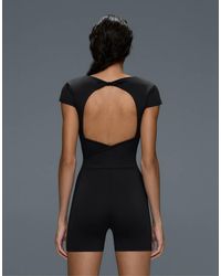 Oysho - Comfortlux Open-back Short Jumpsuit - Lyst