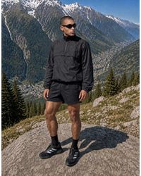 4505 - Ultra Lightweight 1/4 Zip Running Windbreaker With Front Pocket - Lyst