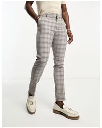 New Look - Pantalones a cuadros marrones - Lyst