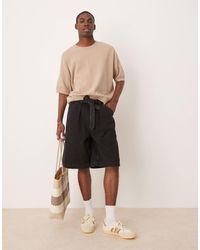ASOS - Bermuda long en jean à pinces avec liens noués à la taille - délavé - Lyst