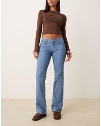 Wrangler - X Lainey Wilson Bootcut Jeans - Lyst