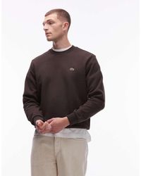 Lacoste - Sudadera Marrón Con Cuello Redondo De - Lyst